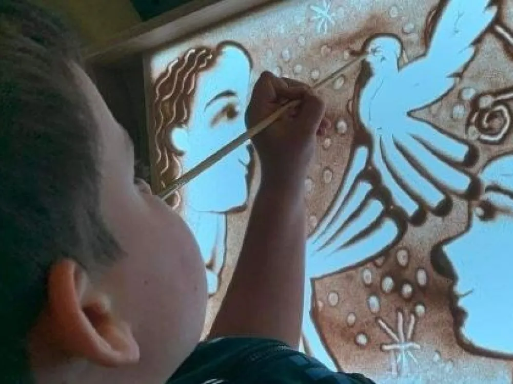 Skapa med ljus, sand och laser