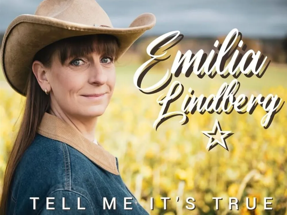 EMILIA LINDBERG BY THE RIVERSIDE