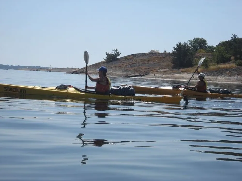 Kayaking in the archipelago & camping at dusk.