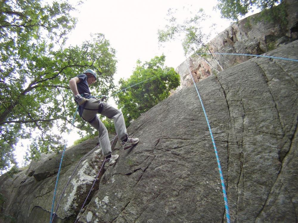 Rappelling from a 30m cliff in the archipelago and grilling at dusk.