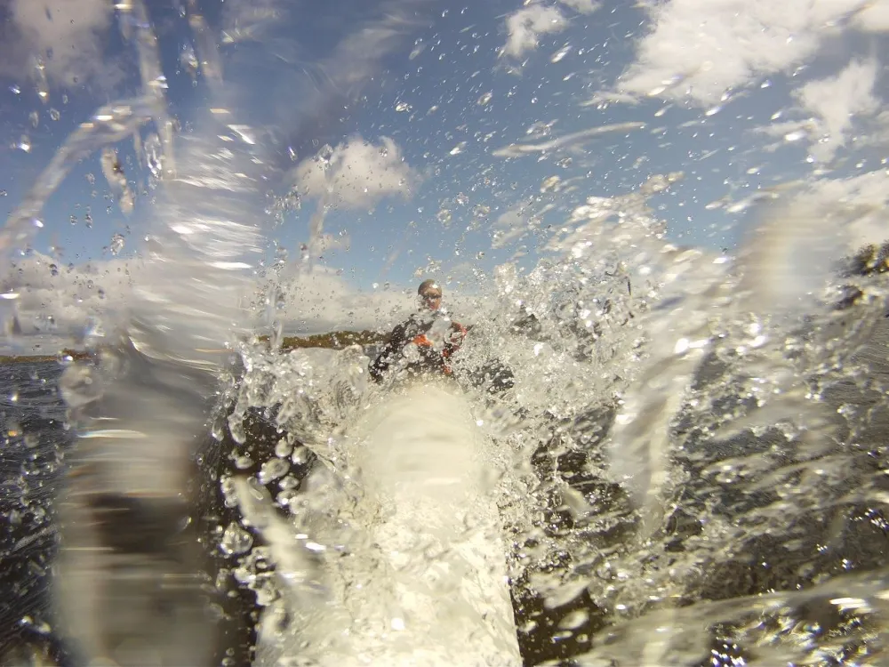 Test to kayak with a surfski in the small waves of archipelago of Karlskrona.